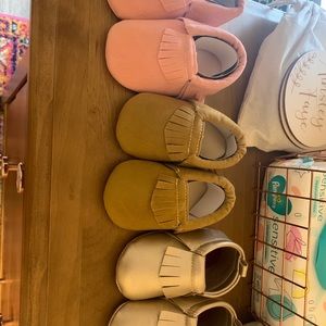 Set of 2 baby moccasins.